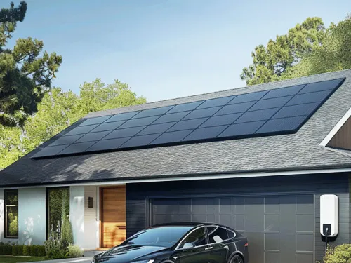 Black-on-black QCell 410 solar panels installed on a residential rooftop
